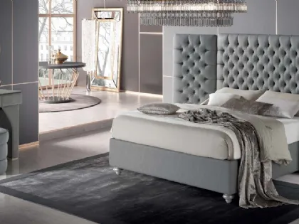 Letto con testiera trapuntata dal design elegante Puccini di Stilfar